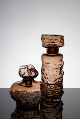 sculptural blown glass decanters in bronze color