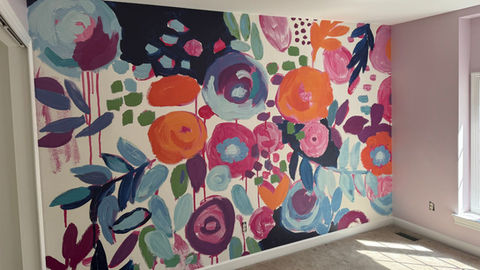 This modern inspired wall mural adds just the right pop of color to this interior wall.