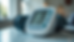 Eye-level view of a digital blood pressure monitor displaying a reading on a table