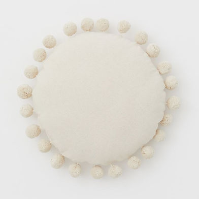 Rond kussen met pompons