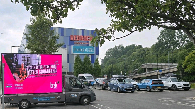 Digi van sign in city