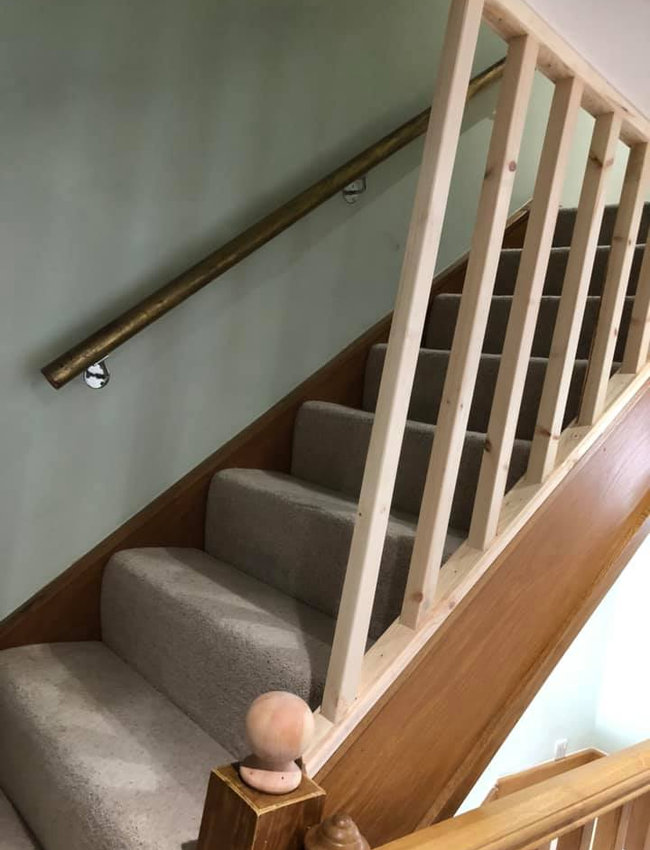 Wooden stair spindles fitted by K&O Services