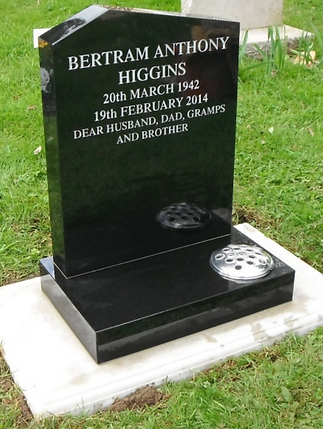 Solid black marble headstone