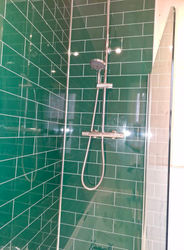 Green tiled shower
