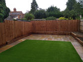 Newly laid grass in a medium sized garden