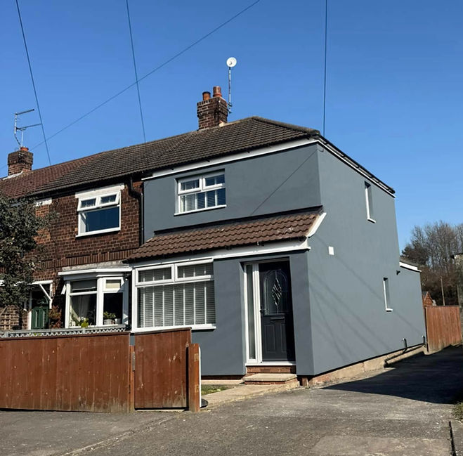 Grey rendered house