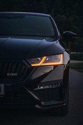 Dark car with headlights