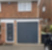 Grey door and garage door