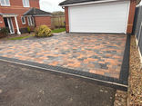 Large paved driveway completed