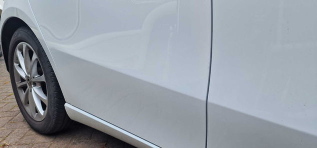 Large dent repaired by PDR
