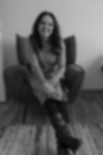 Smiling woman in armchair
