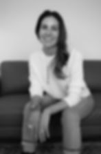 Smiling woman sitting on a couch
