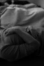 Person resting, hands on stomach
