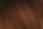 Close-up of a rich, dark brown wood grain surface texture details