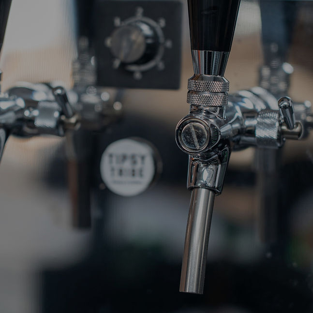 Taps in the taproom at Tipsy Tribe Brewery & Distillery