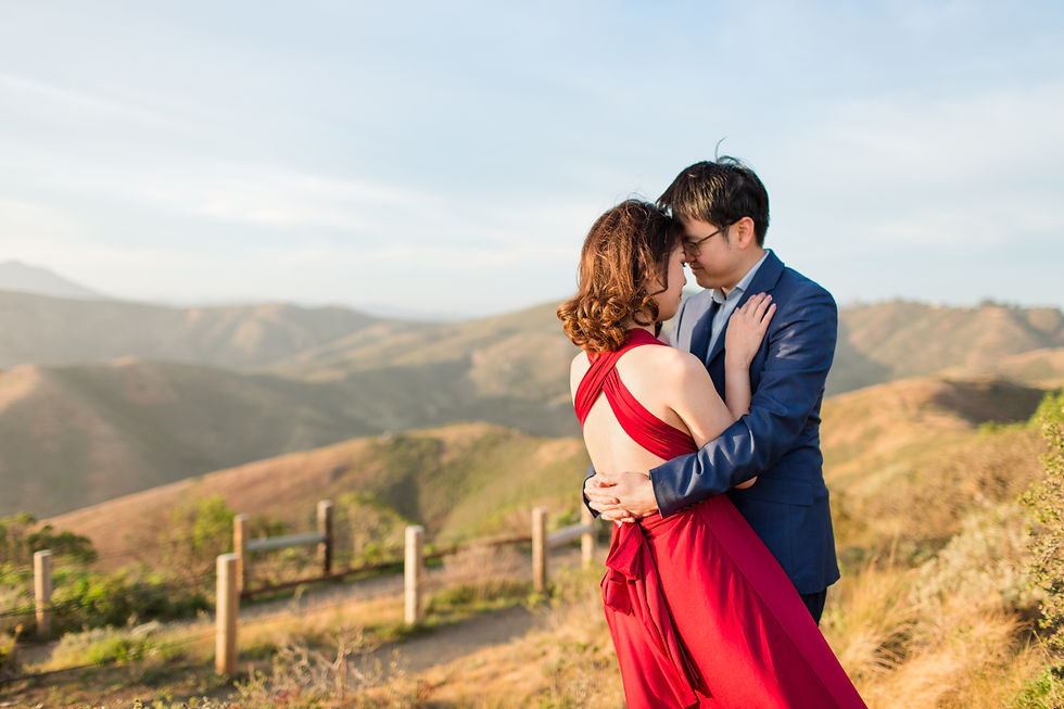 Marin Headlands Engagement session Bay Area Photography hkcreate couple photos red dress pink dress blue suit black sands beach rodeo beach san francisco hawk hill engagement photoshoot golden hour sunset