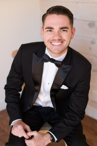 hk create hkcreate photography bay area wedding photographers nella terra cellars winery sunol wedding venue vineyard golden hills summer wedding classic black tuxedo vineyard sky blue color scheme princess dress bride groom natural light and airy beautiful  joyful candid creative sister duo groom getting ready 