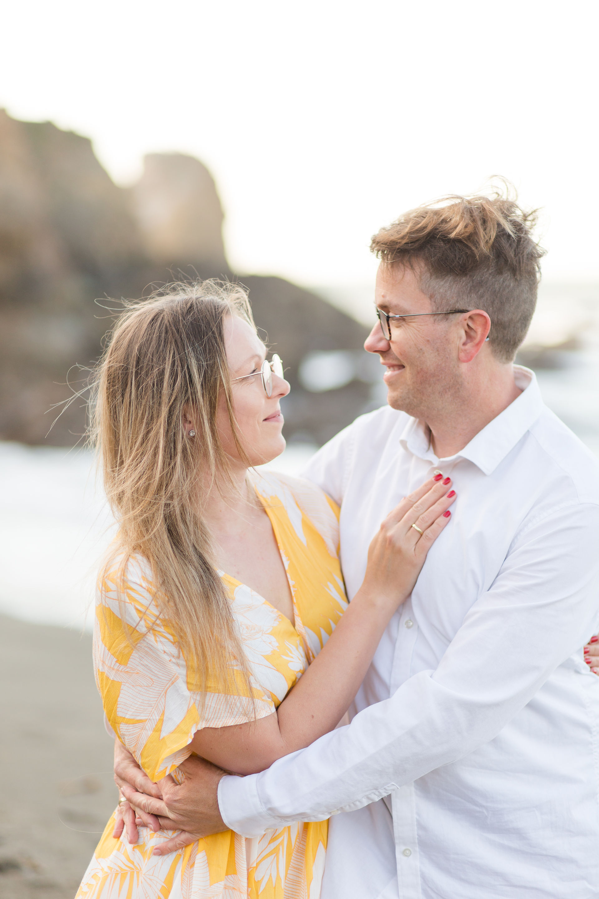 hkcreate hk create heather and kissy photography duo bay area family photographers mini session beach rockaway beach pacifica yellow and cream outfits family of three loving sweet cute joyful light and airy