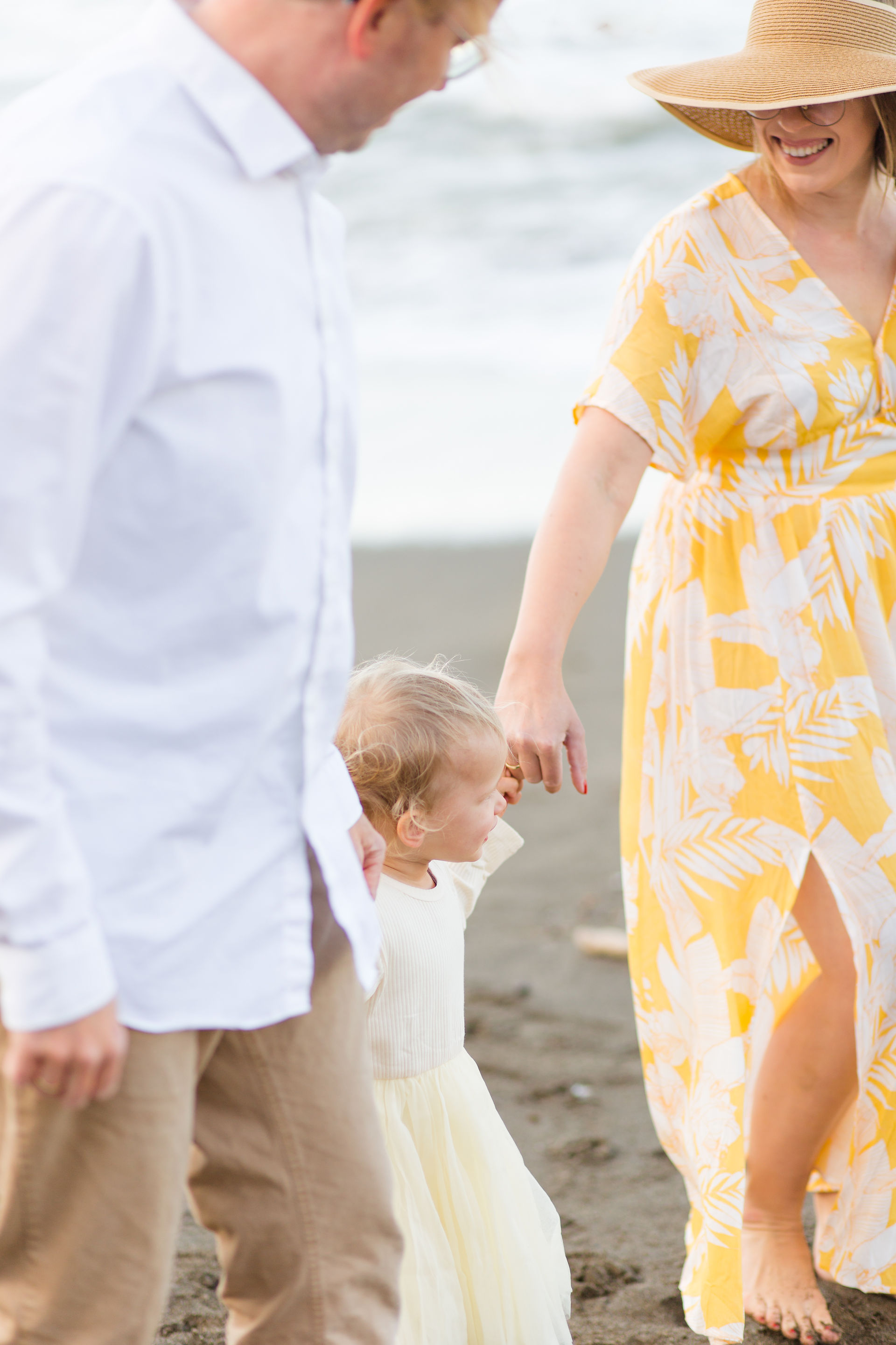 hkcreate hk create heather and kissy photography duo bay area family photographers mini session beach rockaway beach pacifica yellow and cream outfits family of three loving sweet cute joyful light and airy