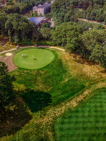 Aerial shot of hole 4 showing secluded green on solitary hill