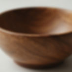 Close-up of a rounded wooden bowl