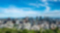Panoramic view of downtown Montreal skyline under blue sky, representing Integria Consulting’s executive search presence in Canada, Quebec and Ontario