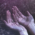 Two palms open to the sky