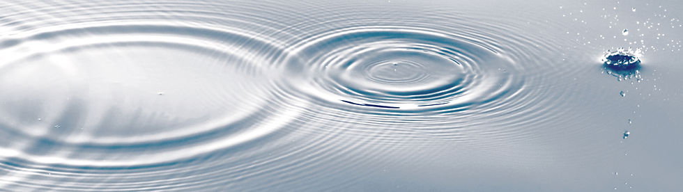 Ripples spread in calm water, forming concentric circles. Droplets create splashes, adding a tranquil yet dynamic vibe.