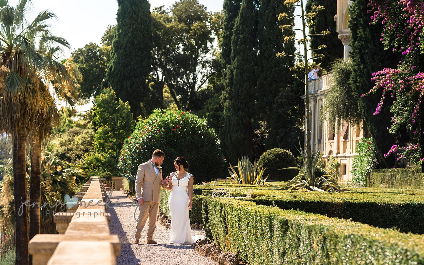 bride and groom walking around the gardens at Isola Del Garda, Lake Garda, Italy. Destination wedding photography