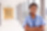 Portrait Of Female Nurse Standing In Hos