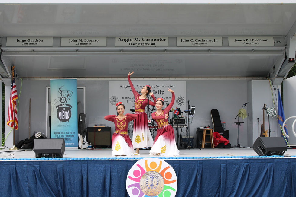 Town of Islip Cultural Arts stage displayed nonstop entertainment with performances scheduled throughout the day, including performances by The Long Island Chinese Dance School.