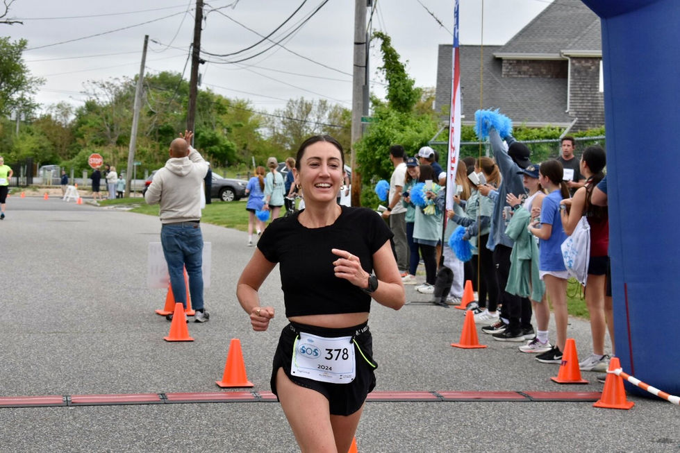Brittany Colasanto, second-place finisher for women in the 10K run, finished with an impressive time of 47:10.
