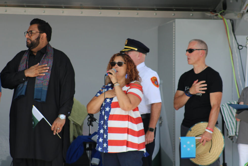 Rachel Jarvis of The Blend sang the national anthem during the opening ceremony.