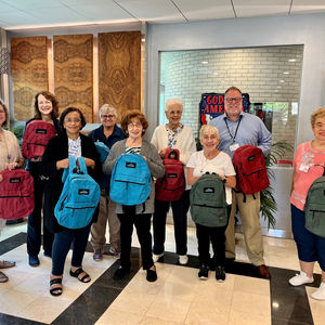 Backpack giveaway hosted by Momentum at South Bay for Rehabilitation and Nursing