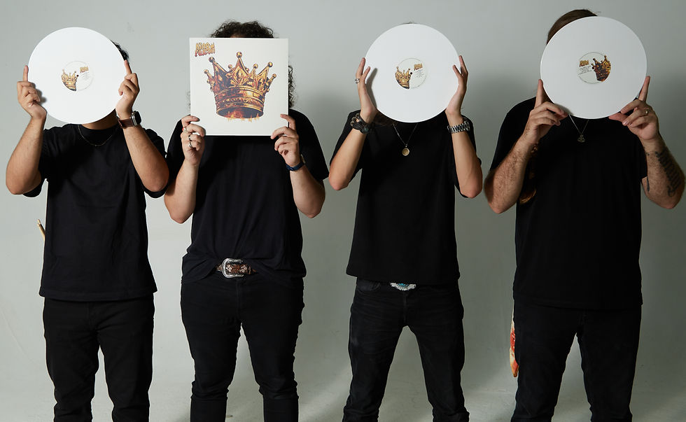King Falcon posing with their self-titled debut album. Photo: Eddia Jane Photography