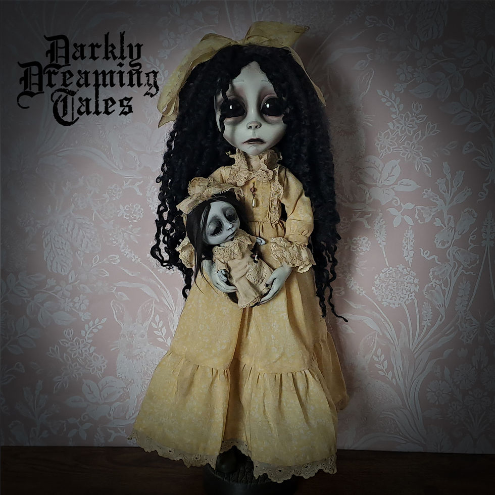 Thumbnail: a unique artist doll with sad eyes and black curly hair in a long victorian flowery yellow dress