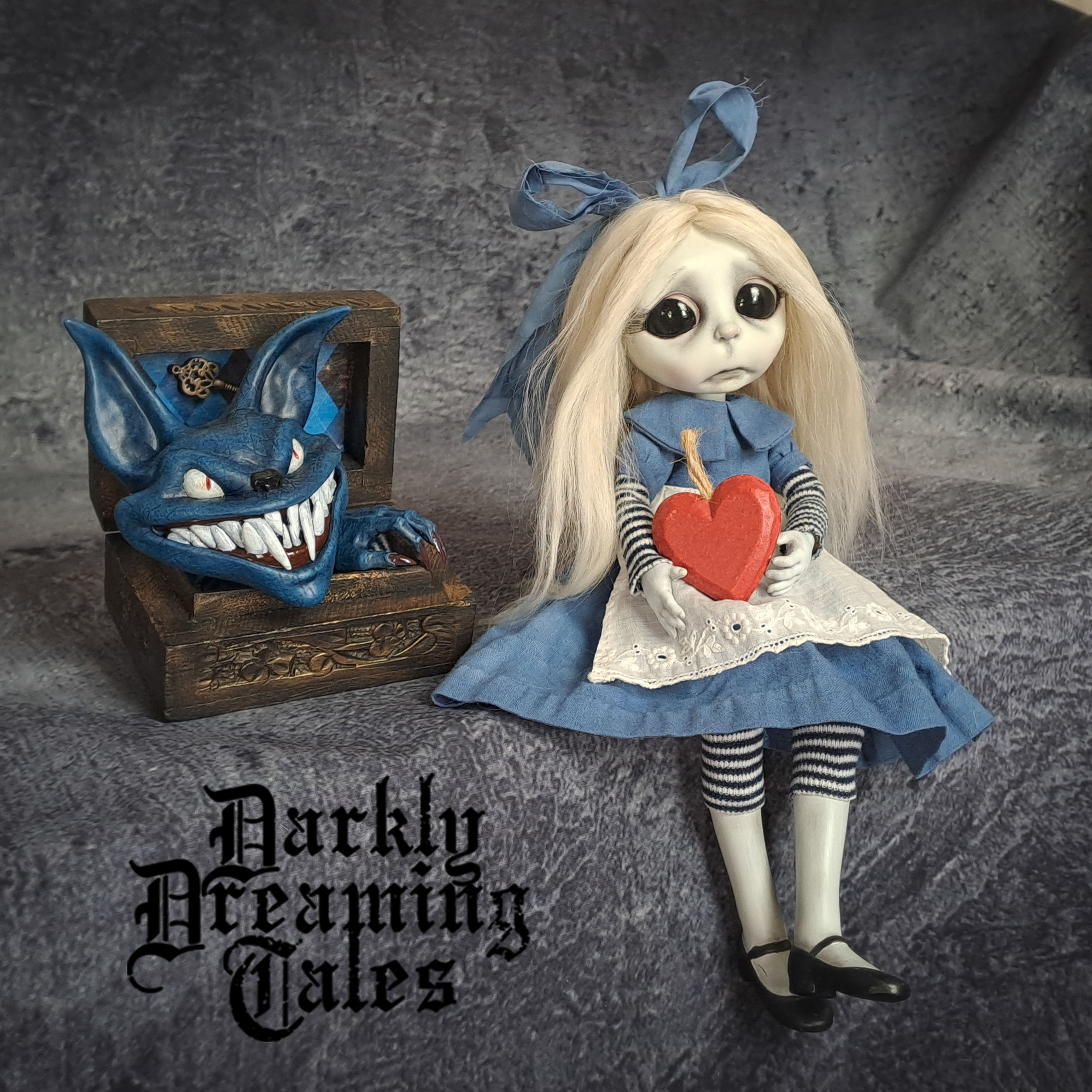 Frightened little Alice and her Cheshire Cat in a Wonderland themed box