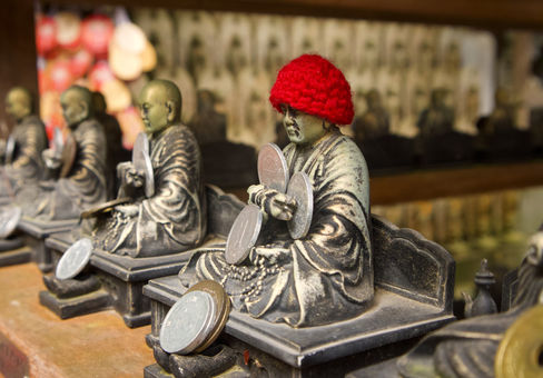 Buddha with red hat miyajima