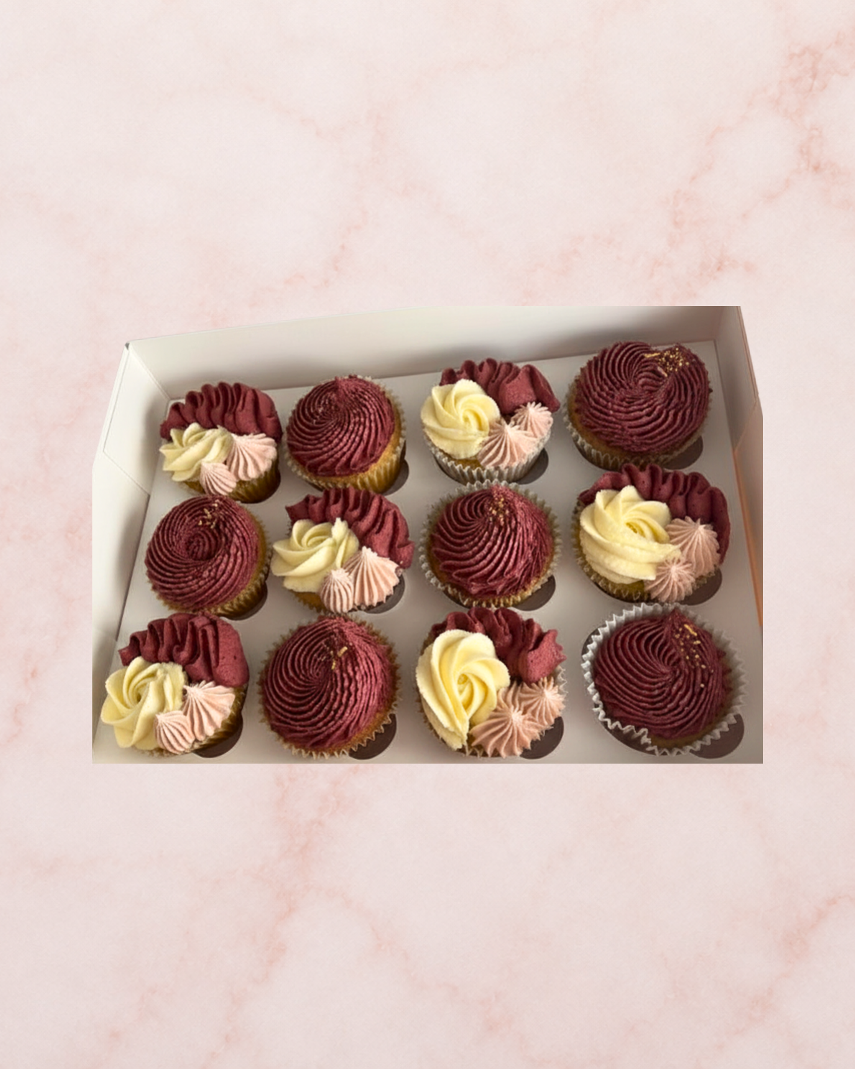 Zero Regrets assorted cupcakes in a white box