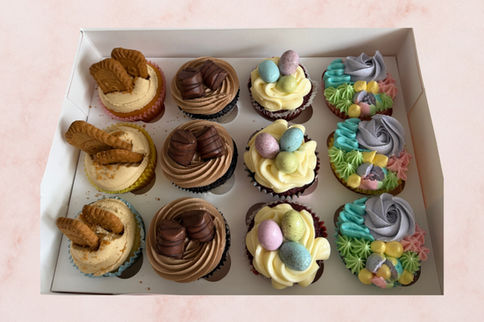 Assorted cupcakes with Biscoff, chocolate, and Easter egg toppings