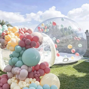 balloon arch and inflatable bubble house