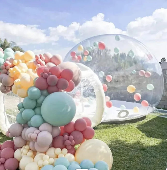 Balloon arch and blow up bubble house