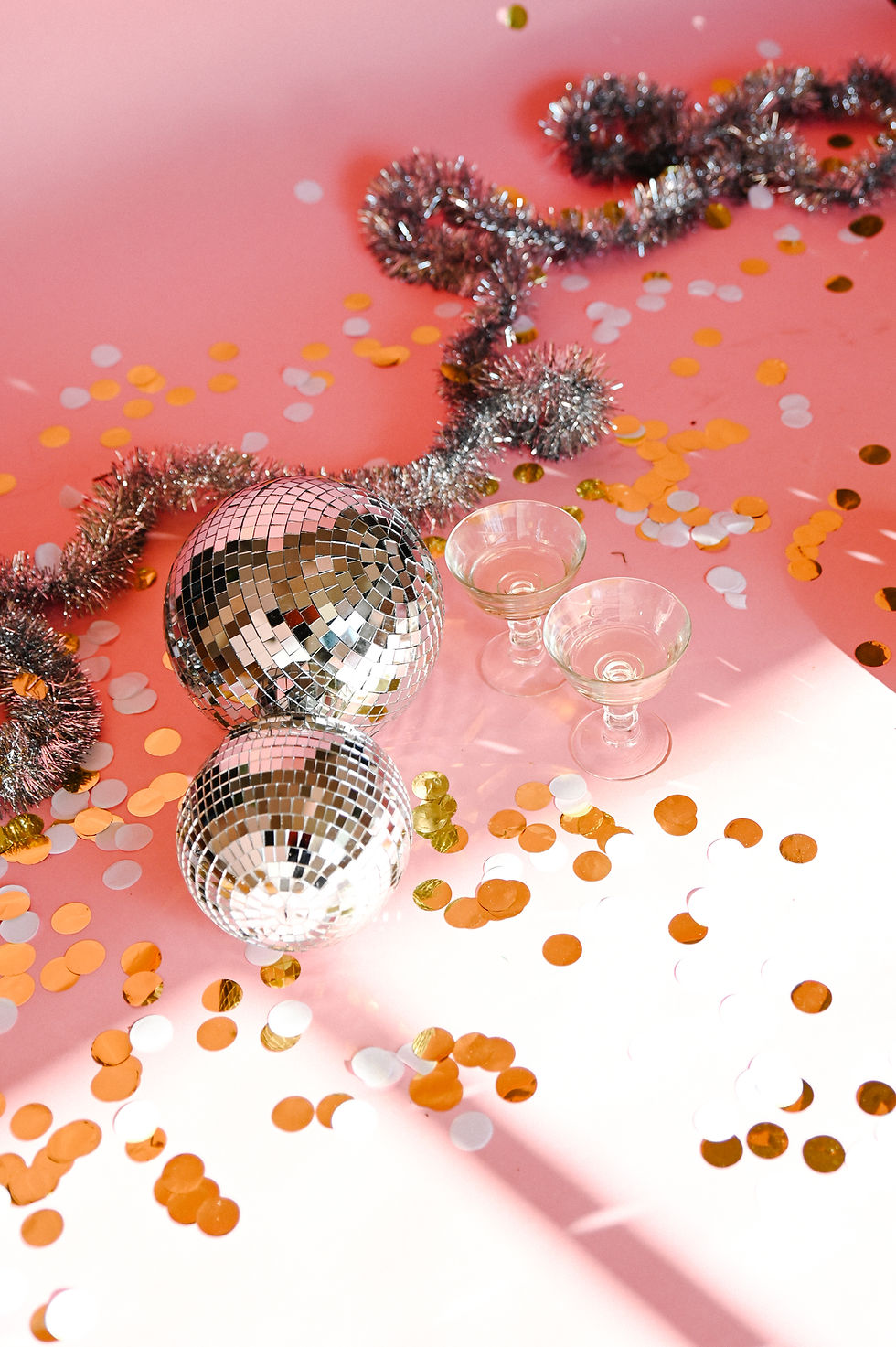 disco balls, confetti, garland and drink glasses