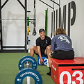 Coach conducting athlete performance testing at Jump Lift Run Perth