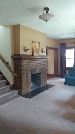 remodeled home in Lincoln has new lighting and a large staircase
