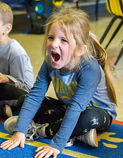 Kids acting in drama class