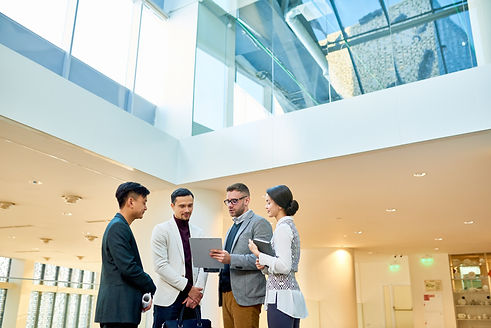modern-business-people-discussing-work-2023-11-27-05-20-29-utc.jpg