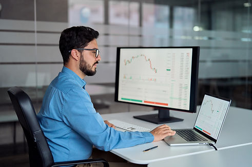 busy-business-man-broker-analyst-investor-using-la-2023-11-27-05-36-18-utc.jpg