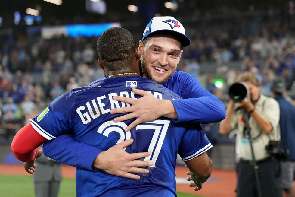 Trey Yesavage and Vladimir Guerrero Jr. following ALDS Game 2. Courtesy of Natan Denette/The Canadian Press. Obtained by HNGnews