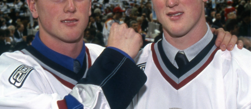 Daniel and Henrik Sedin after being drafted by the Vancouver Canucks in 1999